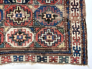 Early colorful moghan Kazak rug with classic memling gul field and nearly square size. Somewhat unusual and spacious ivory border. All good natural colors. As found, scattered areas of wear and a  ...