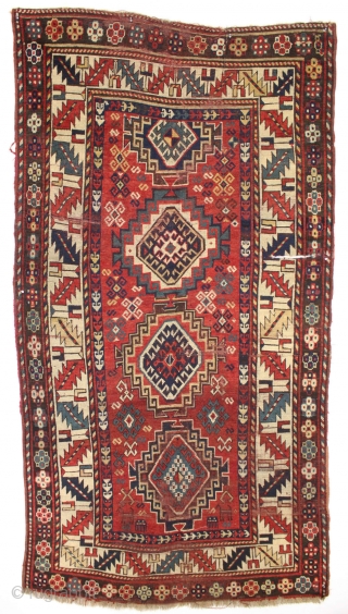 antique good sized kazak. Better than average example of this design. The unusually large scale of the rather common border gives the piece a bit of punch. "as found", some wear, oxidation  ...