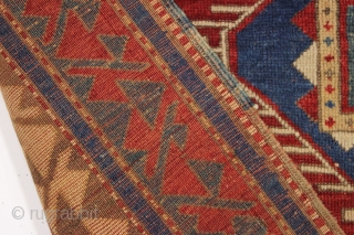 antique bordjalou kazak prayer rug. Iconic design. All natural colors featuring a beautiful red ground, nice old greens and pretty medium blues. Unrestored, near original condition. Slight wear. Could use a bit  ...