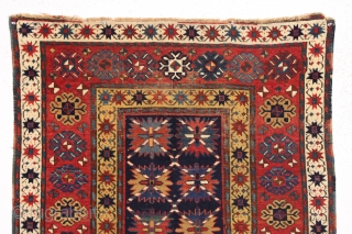 antique kazak or gendge rug with an interesting design and superb natural colors. Very high qualty weaving with beautiful wool. Deep blue ground. Washed but unrestored with mostly good pile, slight scattered  ...