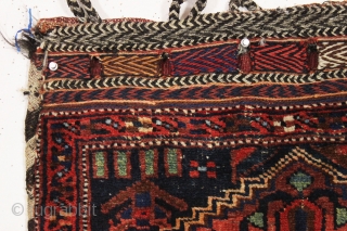 antique northwest persian bag complete with original back. Interesting design using a partial rug medallion. Good pile. All good colors. late 19th c. 20" x 21"       