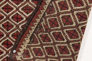 Antique tiny Baluch rug with an unusual allover design. All natural colors. "as found", with some wear as shown but original sides and ends. Reasonably clean with a small old stain as  ...