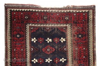 antique baluch rug with mina-hani design field. Characteristic older asymmetric flowers. All good natural colors with a nice ember red. Floppy handle with some scattered wear and heavy brown oxidation. Good age,  ...