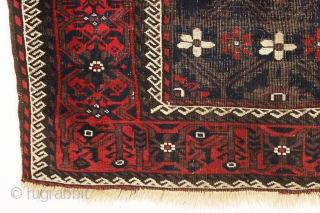 antique baluch rug with mina-hani design field. Characteristic older asymmetric flowers. All good natural colors with a nice ember red. Floppy handle with some scattered wear and heavy brown oxidation. Good age,  ...