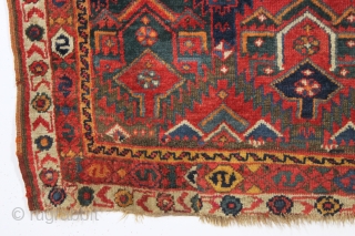 antique kurdish "flaming" palmette rug fragment. Spectacular natural colors and thick glossy wool. As found recently with a little wear, few creases, and inexplicably reduced in length at bottom. Priced accordingly. Could  ...