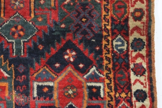 antique kurdish "flaming" palmette rug fragment. Spectacular natural colors and thick glossy wool. As found recently with a little wear, few creases, and inexplicably reduced in length at bottom. Priced accordingly. Could  ...