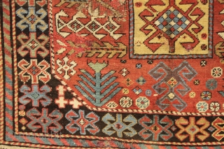 antique caucasian long rug, probably akstafa, with an interesting design featuring bold chajli type medallions. As found, with good fine weave and allover low pile, heavy brown oxidation, a few crude patch  ...