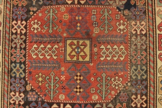 antique caucasian long rug, probably akstafa, with an interesting design featuring bold chajli type medallions. As found, with good fine weave and allover low pile, heavy brown oxidation, a few crude patch  ...