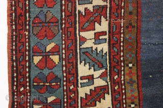 antique kazak rug with an eye catching empty field. Mostly good pile. As found, a bit dirty with scattered slight wear, few very small holes and creases as shown. Original selvages and  ...