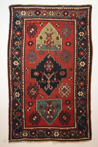 Antique Kazak. Bold design. Good  original condition. Good healthy pile, a little brown oxidation and slight center wear. No repairs. All good natural colors featuring a very nice green. "As found",  ...