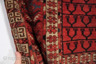 Antique Tekke ensi with rich red ground, glossy wool, and vibrant electric blue highlights. Mostly good even pile with scattered light wear. No repairs. All natural colors. Reasonably clean. Text book example  ...