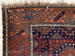 Nice little antique blue ground Baluch rug. Interesting design featuring memling gul like devices and 6 animals. All natural colors including a fine tomato red and electro blue highlights. Fair overall condition  ...