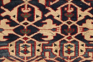 Antique caucasian Konaghend rug. Highest quality weaving. Possibly attacked by wolves. Thick glossy high pile but both end borders damaged. Numerous scattered chewed spots very crudely "repaired". All is not lost as  ...