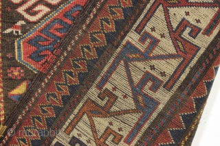 Antique caucasian rug. Unusual field and an interesting rendition of this border type. All natural colors. An unusual palette including a deep natural orange, a strong clear yellow, a dark aubergine and  ...