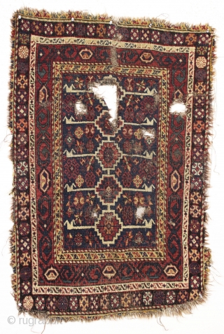 Antique very small south persian rug with an unusual design I have not seen before. All good colors. Very very rough condition. Still spell binding. 19th c. 2'6" x 3'9"    ...