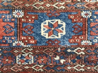 Antique Kurdish divan cover. Older example of this well known type. Mostly decent pile. All good natural colors featuring lovely blues, deep greens and a rich apricot orange. Scattered wear, creases, and  ...