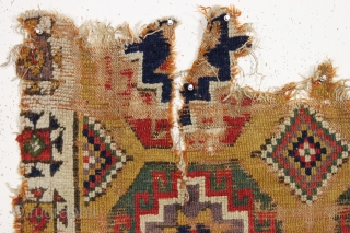 Early yellow ground Anatolian rug fragment. Remnant original selvage on both sides. Genuine art. Needs mounting. 18th c. 3'8" x 3'7"            