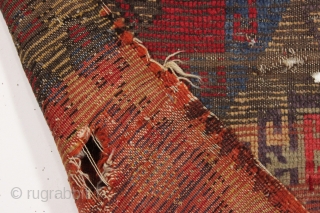 remains of an old Anatolian rug. Damaged fragment. ca. 1800 or before. 3'3" x 3'5"                  