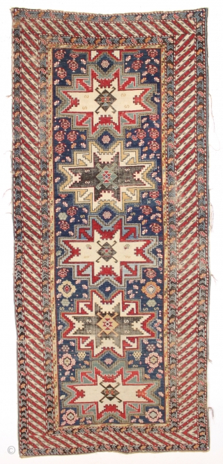 antique caucasian rug, probably shirvan, with bold Lesghi stars and an eye catching border. All natural colors featuring lovely greens and lots of a good old yellow. As found, not restored, with  ...