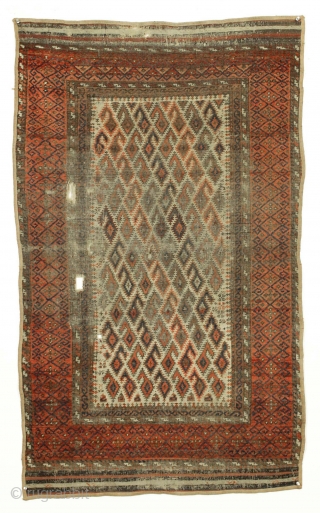 Antique ivory ground baluch rug. Unusual border and ivory, not light camel ground. Looks like all good colors but very very dirty. Rough condition as shown. 19th c. 3' x 4' 11"  ...