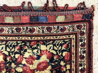 Antique Persian afshar bag in excellent condition complete with original back and closure tabs. Pretty floral rose design field with lots of true greens. Very good even pile. Rich natural colors. Few  ...