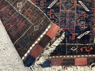 Antique original complete pair of Baluch bags as woven with an interesting very uncommon design including terrific “money” borders. Overall low pile with scattered wear and heavy oxidation as shown. All natural  ...