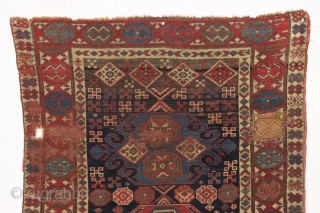 antique caucasian long rug in as found condition. An early example with unusual and elegant medallions. Beautiful border. All good natural colors. Soft and supple like cloth. A hard life with scattered  ...