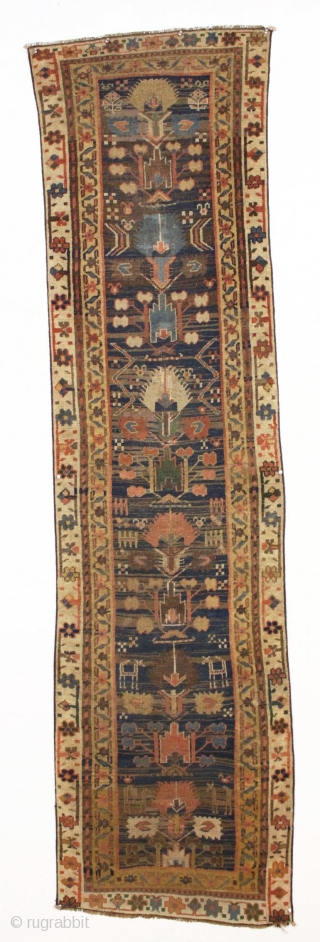 early northwest persian or kurdish rug. Strange and mysterious remnant, probably a fragment. "As found", very dirty with scattered old repairs and likely missing an outer border. Compelling. ca. 1850, possibly earlier.  ...