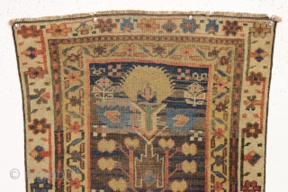 early northwest persian or kurdish rug. Strange and mysterious remnant, probably a fragment. "As found", very dirty with scattered old repairs and likely missing an outer border. Compelling. ca. 1850, possibly earlier.  ...