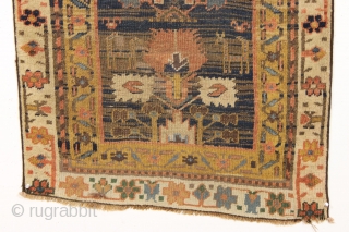 early northwest persian or kurdish rug. Strange and mysterious remnant, probably a fragment. "As found", very dirty with scattered old repairs and likely missing an outer border. Compelling. ca. 1850, possibly earlier.  ...