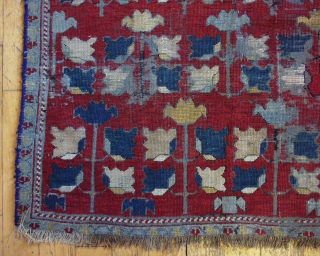 Antique caucasian rug. Another mystery rug. Interesting but very rough condition. Heavy oxidation. Low pile and wear. Edges not original. Small holes. Old burlap backing sewn on and mostly removed. Natural colors?  ...