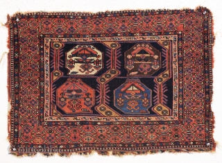 Antique afshar bagface with iconic field design but a very unusual border. All natural colors. Allover even low pile. Edges rough as found. Washed but no repairs. Interesting 19th c. weaving. 24"  ...