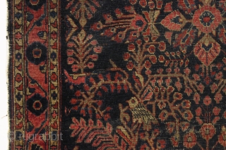 four bunnies of the apocalypse. Antique sarouk rug with four rabbits and six great birds. As found, very dirty with wear and end unraveling as shown. Old residual glue or rug pad  ...