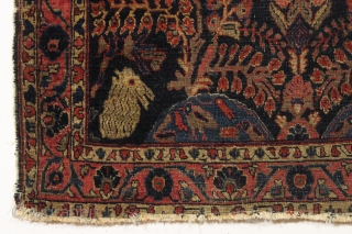 four bunnies of the apocalypse. Antique sarouk rug with four rabbits and six great birds. As found, very dirty with wear and end unraveling as shown. Old residual glue or rug pad  ...