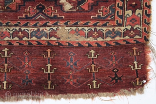 antique turkman yomud chuval. Older example unfortunately ravaged by wolves. Nicely drawn field and better than average elem panel. All natural colors. As found condition and priced accordingly. Ca. 1870 or earlier.  ...