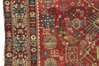 antique caucasian rug, probably shirvan. Local fresh find. Older variant of a well known design. The numerous endless knots are an interesting addition to the archaic main floral devices. "as found", very  ...