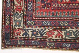antique kazak in good condition with unusual soft coloring. Interesting example of a Kazak long rug with karachopf variant design. Nice active border. Mostly good fleecy pile. unusual soft palette with all  ...