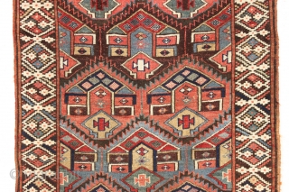 antique kurdish palmette long rug in excellent original condition with no repairs. Beautiful field design paired with an interesting border. All natural colors including some pretty camel wool pile. Washed, but otherwise  ...