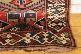 antique kurdish palmette long rug in excellent original condition with no repairs. Beautiful field design paired with an interesting border. All natural colors including some pretty camel wool pile. Washed, but otherwise  ...