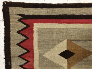 Antique small Navajo rug with a very eye catching design. Fresh New England find. Beautiful colors and soft blanket like handle. In reasonably good condition with some slight selvage roughness and a  ...