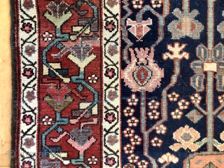 Antique northwest Persian runner with a lovely floral design field and border. As found, reasonably clean and in very good condition with even pile and good edges. All natural colors including fine  ...