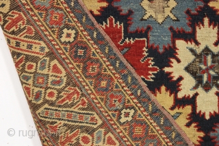 Antique east caucasian snowflake design rug, probabaly shirvan, with a nicely drawn chi chi border. High quality wool and all excellent natural colors. "As found" with damage as shown and priced accordingly.  ...