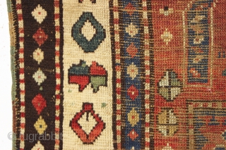 One of the most archaic and powerful little kazak or Karrabaugh prayer rug I have had. Right up there in rough condition as well. Very coarse weave. All good colors. Recently washed.  ...