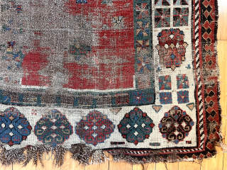 Early Caucasian rug with some usual and some unusual design features. Talish group long narrow format with iconic endless knot and “dice” elements. The additional quirky field decoration makes this a unique  ...