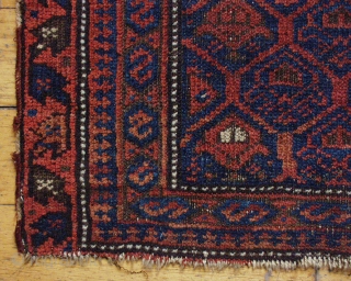 Antique Baluch bagface. Another "shrub" bag. "as found", Low pile, border loss, small nibble. Good colors. 16" x 23"..              