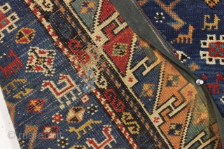 antique kuba rug. Fresh New England find. Interesting design with large tulip palmettes and a jungle of little animals. All good strong natural colors featuring a pretty abrashed medium blue ground and  ...