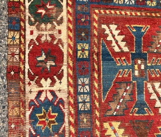 Early Kazak rug with an uncommon field design and an eye catching border. The best example of this type I have encountered. Beautiful old natural colors including lovely old greens. Overall low  ...