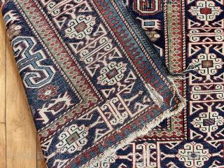 Antique Caucasian perpedil rug. Classic field with nicely drawn “Kufic” border. Good range of natural colors. Even low pile with scattered wear. Rough edges, gouges, small tears. Reasonably clean. Nice wall piece.  ...