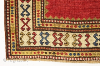 antique very small kazak rug with a mystifying empty field. Good even low pile. All lovely natural colors. Clean. A little jewel. ca. 1875 2'10" x 3'7"      