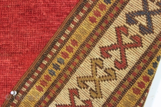 antique very small kazak rug with a mystifying empty field. Good even low pile. All lovely natural colors. Clean. A little jewel. ca. 1875 2'10" x 3'7"      